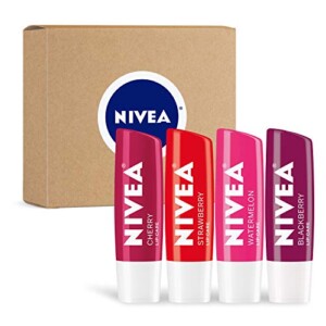 a group of lip balms in front of a box
